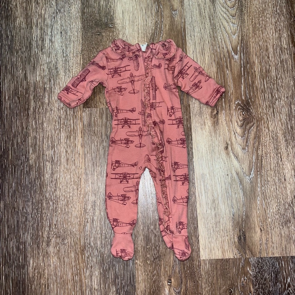 Ruffle zip footed baby pajama